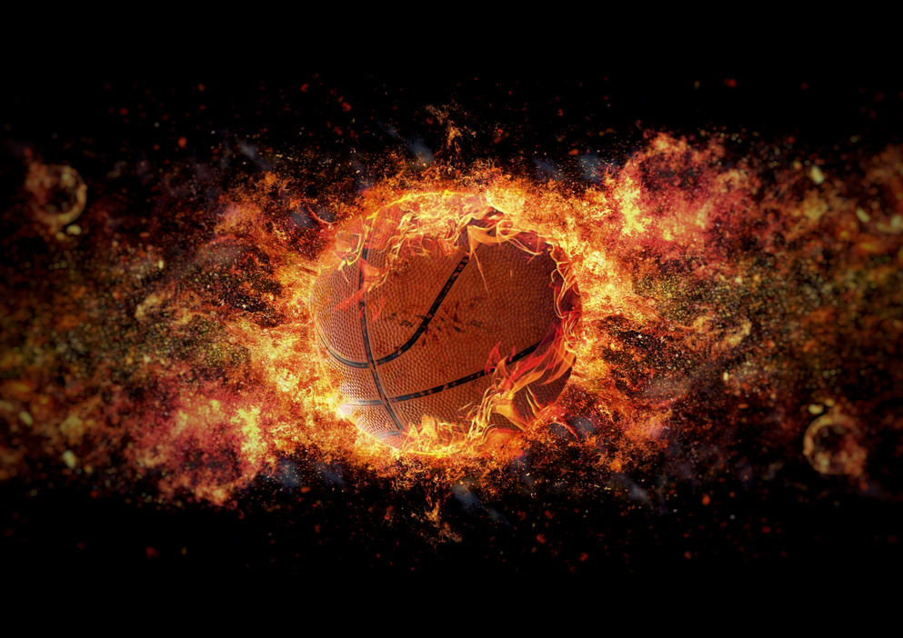 Basketball ball wrapped in flame